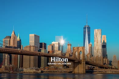 New York City skyline with bridge and HGV logo
